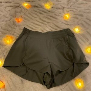 Lululemon shorts on lines for running color, olive size size 10
